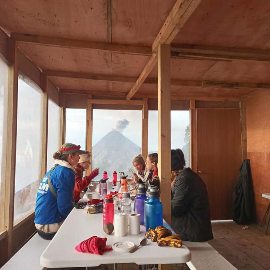 Antigua: 2-Day Acatenango Volcano Hike w/Local Guide & Meals - Base camp cabins and nighttime Fuego views