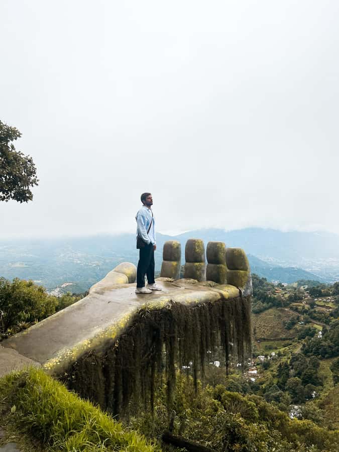 Antigua: Altamira and Hobbitenango Movie Themed Parks Tour - Altamira: wooden giants and a giant hand
